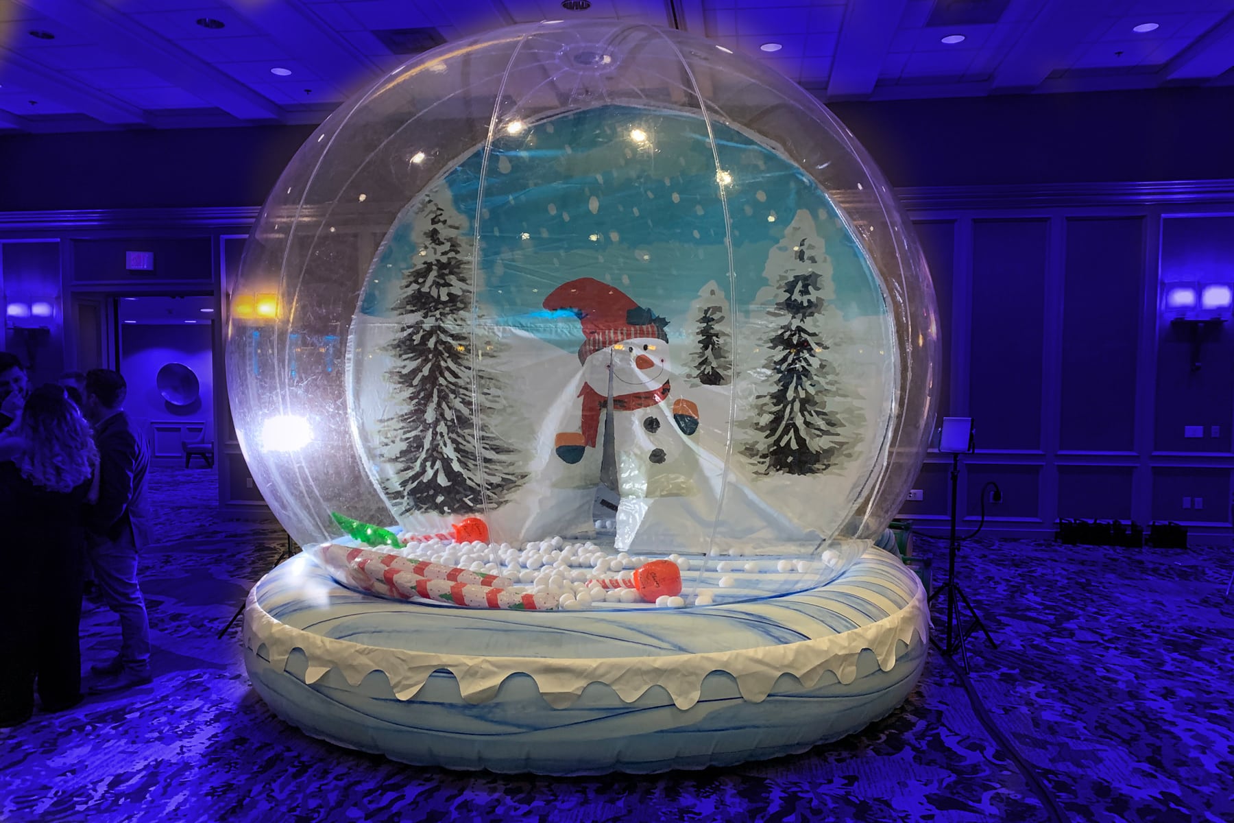 Giant snow globe, inflated and set up to do animated gif photos of guests inside.